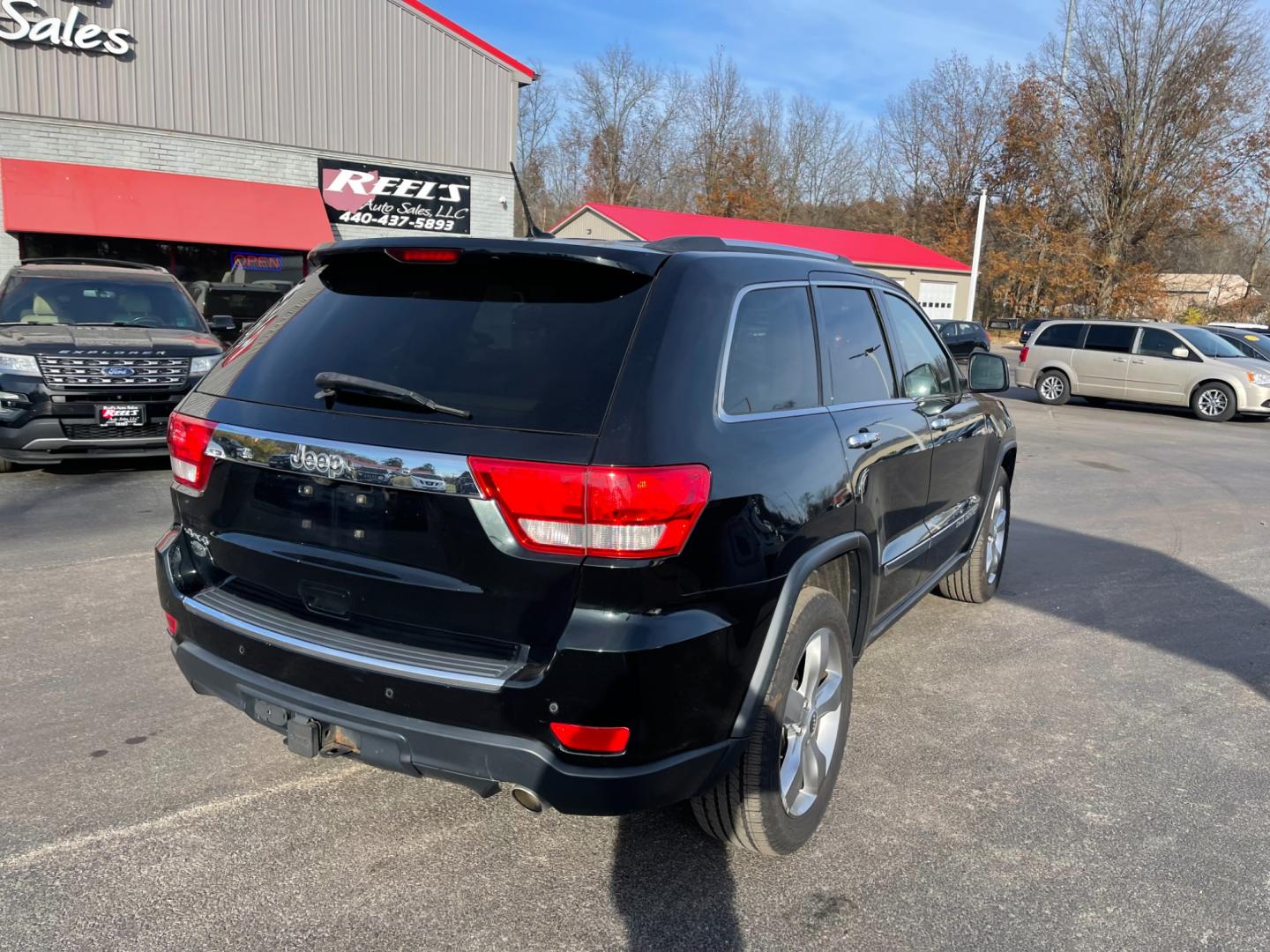 2013 Black /Gray Jeep Grand Cherokee (1C4RJFCG5DC) , located at 547 E. Main St., Orwell, OH, 44076, (440) 437-5893, 41.535435, -80.847855 - Photo#8